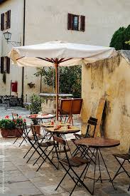 Table And Chairs From Outdoor Cafe Bagno Vignoni Tuscany Italy Outdoor Cafe Italian Patio European Cafe