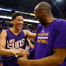 He wears his shoes, imitates his moves, and lives his philosophies. Kobe Bryant Gave Devin Booker Signed Shoes And Told Him To Be Legendary Silver Screen And Roll