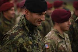 KOVIN, Serbia -- A Serbian Paratrooper earns his American