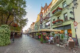Toruń, tanie noclegi, noclegi w centrum. People Walking On The Old Town Of Torun Poland Stock Photo Picture And Royalty Free Image Image 59391700