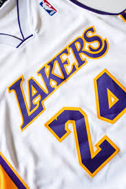Kobe bryant's los angeles lakers #24 jersey. Kobe Bryant Lakers Nba Jersey 24 Photo Free Apparel Image On Unsplash