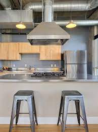 Want a stainless steel kitchen sink? Stainless Steel Countertop Gray Walls Metal Bar Chairs Backsplash Com