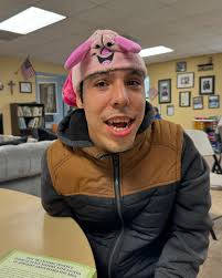 BJ is wearing Raven's sweater. I'm not sure Raven thinks it's as funny as  BJ does.😂