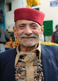 In general, though tunisians consider themselves to be more liberal and tolerant than their neighbours—most urban women, for example, dress in western clothes and do not veil themselves, and (though it is considered inappropriate by some tunisian muslims) locally made wines and spirits are consumed—they still maintain a strong islamic identity. Man Wearing Traditional Felt Hat Chechias Sfax Medina Tunisia Tunisia People Of The World People Around The World