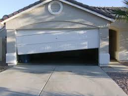 Learning how to fix a garage door that's off track is an important diy skill as a homeowner. Orlando Off Track Garage Door Tracks Rollers Cables