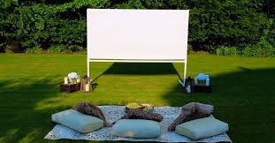 You can build a painted screen. Diy Backyard Movie Theatre Screen Hometalk