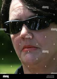 Barbara Botha, the widow of South Africa's last hard-line white president,  P.W. Botha, talks to the media outside their home, Die Anker, in the  seaside resort of Wilderness, South Africa, Wednesday, Nov.