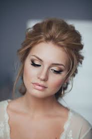 Check out this gorgeous, romantic, low bun hairstyle from weddingomania. Ultimate Wedding Hair Styles Tania Maras Bespoke Wedding Headpieces Wedding Veils