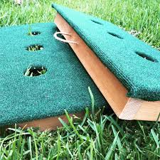 If a washer lands in the hole it's worth 3 points and if it lands in the box its worth 1 point. How To Play 3 Hole Washer Toss