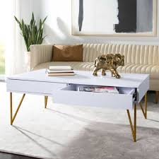 This handy table is perfect for drinks, books and magazines but it also provides neat storage for tv remotes, pens and drinks mats, thanks to the drawers that open to each side. Pierce Two Drawer Coffee Table White Gold Coffee Table With Storage Pine Coffee Table Coffee Table White