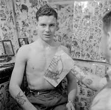 Maybe you would like to learn more about one of these? Photograph Showing An Unidentified Man In A Tattoo Parlour Nigel Henderson C 1949 C 1956 Tate Archive Tate