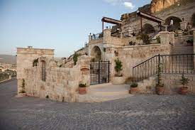 Balcony bathrobes bathroom with bathtub bathroom with shower bathroom with window. Kayakapi Premium Caves A Boutique Hotel In Cappadocia Page