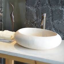 The small bowl honed travertine circular vessel bathroom sink is made from natural beige travertine stone. China Sunny Yellow Beige Marble Cocoon Vessel Sink China Vessel Sink Stone Sink