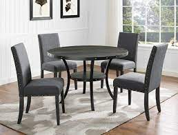 This industrial seared oak dining table invites the whole gang to gather around, enjoy a meal and linger for dessert and conversation. 1213dgy T 48 5 Pc Wallace Dark Gray Finish Wood Round 48 Dining Table Set