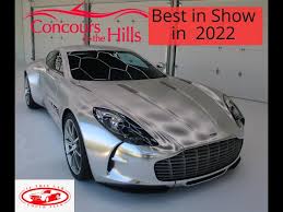 Image result for Concours Blue 2011 Aston Martin