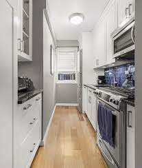 Gray And White Galley Kitchen In New York White Galley Kitchens Small Galley Kitchens Galley Kitchen Design