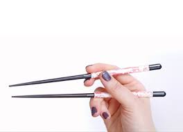 Often foreigners in japan are complimented on how they use chopsticks. How To Hold Chopsticks Like A Professional Purewow