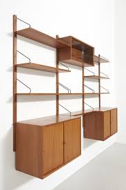 A Wall Shelving Unit In Teak Poul Cadovius Free Standing Shelves Wall Shelving Units Standing Shelves