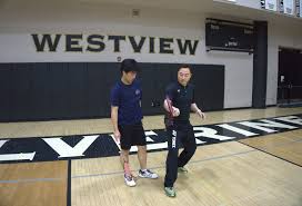 Former world champion coaches badminton