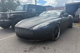 Image result for Storm Black 2013 Aston Martin
