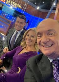 We are all wearing our purple today to match our purple hands and feet from  the cold. Ben Hill Chuck Lofton WTHR-TV