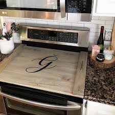 A highly efficient, compact, and portable wood. Diy Monogrammed Wooden Stovetop Cover And Tray Ideas For The Home
