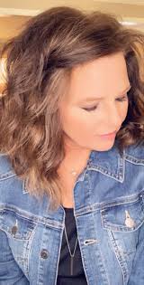 7 Ways to Fix Your Bangs As They Grow Out