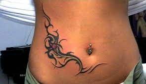 This tribal design appears unique, the twist and small curves appear astounding when tattooed on the belly button. Around The Navel Tattoo Google Search Belly Button Tattoos Tribal Tattoos For Women Tribal Tattoos