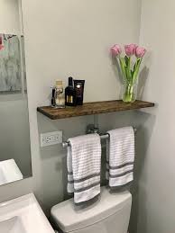 Double Hand Towel Holder With Extra Storage Shelf Can Be A Great Addition Above The Toilet Seat A Combin In 2020 Rustic Towel Rack Towel Rack Towel Holder Bathroom