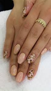 Using a medium dotting tool, make dark pink dots. Pink Nails With Gold Dots And Leopard Print Design