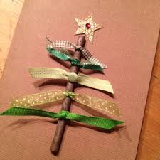 Use thumbtacks to adhere ribbon in the shape of a snowflake to the board. Cute Home Made Christmas Cards Christmas Card Crafts Christmas Cards Kids Christmas Cards To Make
