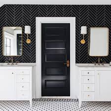 The browns are the dominant color that in contrast with white in this kitchen. 11 Bathrooms With Black Herringbone Tiles