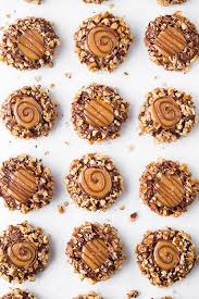 This easy tart, inspired by turtle candies, combines caramel, pecans, and chocolate for a rich filling. Salted Caramel Turtle Thumbprint Cookies Cooking Classy