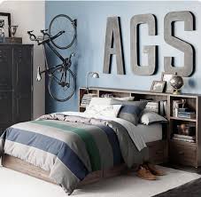An accent wall can be a great addition to a living room, whether you want to break up a large room or just add an interesting design element. 5 Tips For Boys Bedroom Design Navy Accent Wall Large Metal Striped Bedding Wood Bed Bicycle Hanging On The Wal Cc Mike