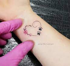 Pin By Naomi Chan On Tatuagens Pawprint Tattoo Tattoos Dog Tattoos