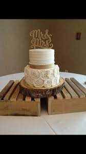 Small 2 Tier Cake With An Elegant Rustic Look Top Tier Has A Homemade Spiral And The Bott Simple Wedding Cake Wedding Cake Centerpieces Wedding Cake Rustic