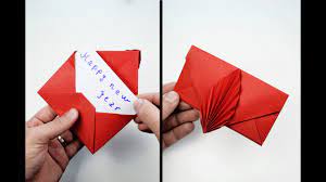 To make an origami turtle, first fold a square piece of paper in half diagonally. How To Make Origami Card For New Year Diy Surprise Gift Card Youtube