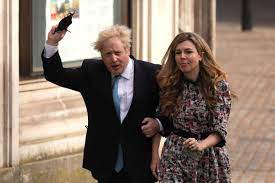 Boris johnson and carrie symonds pose together for a photo in the garden of 10 downing street after their wedding on saturday. Nyffaxulgrl92m