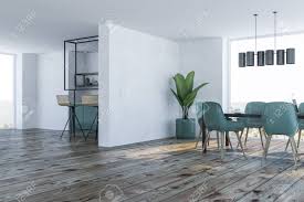 Room floor renovation concept stylish wooden laminate instalation. Corner Of Modern Dining Room With White Walls Wooden Floor Stock Photo Picture And Royalty Free Image Image 112602990