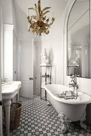 Black And White Checkered Bathroom Decor 11 Grey Bathrooms For Every Design Style In 2020 Parisian Bathroom Vintage Bathroom Lighting Elegant Bathroom