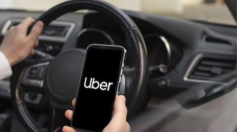 uber layoffs 3300 employees cut work from home ended company invests in ai and robotaxis | Uber ने लिया बड़ा फैसला! 3300 कर्मचारियों की नौकरी खत्म, Work From Home पर भी रोक;