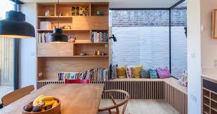 We have a variety of spaces, from dedicated home two original bedrooms were turned into a home library/office space, a dedicated space for the couple to read and sit at the window with a fantastic. A Home Extension Made Space For This Window Seat And Bookshelf