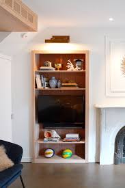 Maybe you would like to learn more about one of these? Bookshelf Design Ideas Wood Lined Built In Bookshelves Provide Extra Storage Space In This Small Living Room