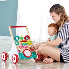 The collection of lullabies for babies and nursery rhymes in this excellent cute this cute music box for babies features a sleepy panda with drowsy eyes and the sweetest nursery rhymes. Hape My First Musical Walker Wooden Push Along Baby Walker Trainer With Music Box Activities 10 Months And Up Buy Fisher Price Musical Activity Walker Fisher Price Stroll Along