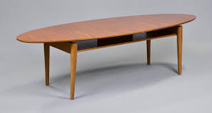 Brown/gold medium round wood coffee table with lift top. Lot Art Mid Century Modern Oval Coffee Table