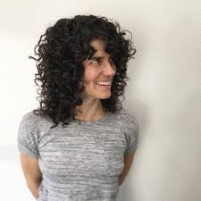 Here's another nice idea for our curly guys. 11 Curly Shag Haircut Ideas Brit Co Curly Shag Haircut Curly Hair Styles Curly Shag