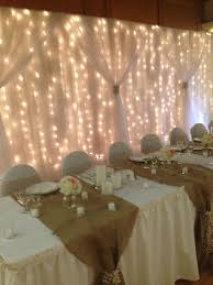 I Like The Burlap Flower Tie At The Front Instead Of It Being The Runner Down The Length O Head Table Wedding Head Table Wedding Backdrop Head Table Backdrop