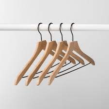 People like them because they are relatively cheap and easy to find. 4pk Wood Hanger Made By Design Target