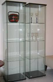 They keep valuables visible yet sheltered from dust and smudgy fingers. Ikea Detolf Glass Curio Display Cabinet Black Ikea Http Www Amazon Com Dp B005vx3lac Ref Cm Sw R Ikea Glass Door Cabinet Display Cabinet Glass Cabinet Doors