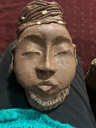 Hi all! I just wanted to introduce myself and share a photo that I took My  first face sculpture I hope to learn some tricks